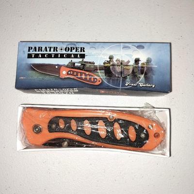 Three vintage bottles two small pocketknives and a new Tactical Frost cutlery Paratrooper Knife