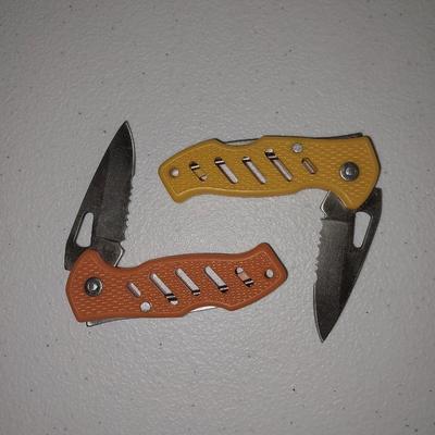 Three vintage bottles two small pocketknives and a new Tactical Frost cutlery Paratrooper Knife