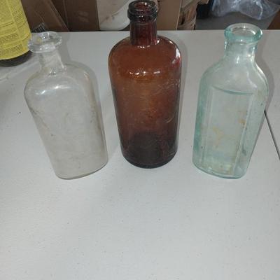 New pocketknives- "The Apache" and the " Eagle eye II" and three vintage bottles