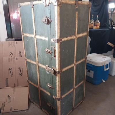 Antique travel wardrobe trunk by Henry Likly & Co.