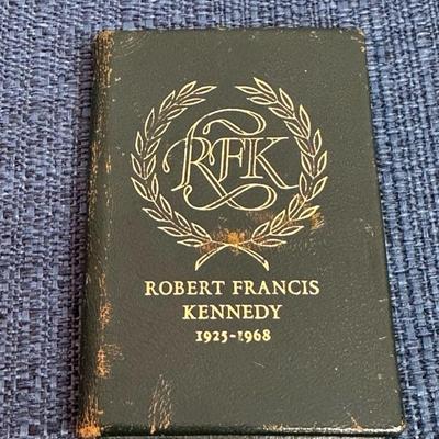 Lot 22 Kennedy pins and RFK Aulogy mini book