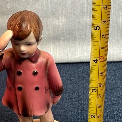 Lot 24 John John saluting  figurine