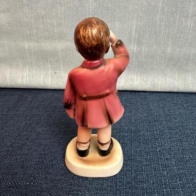 Lot 24 John John saluting  figurine