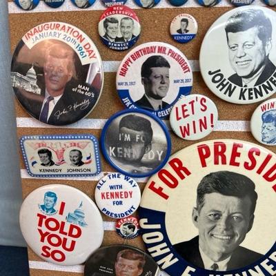 Lot 30 Kennedy button collection on 16 x 16 â€œ corkboard