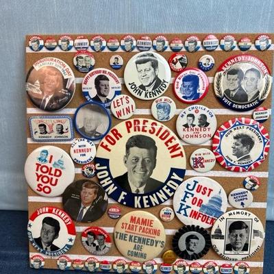 Lot 30 Kennedy button collection on 16 x 16 â€œ corkboard