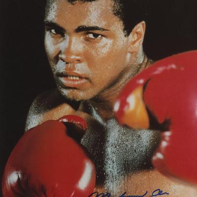 Muhammad Ali signed photo. GFA Authenticated