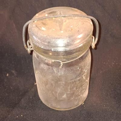 Three Antique jars with lids