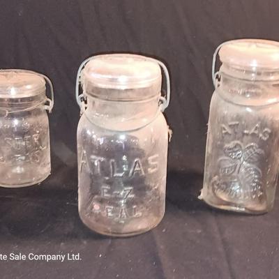Three Antique jars with lids