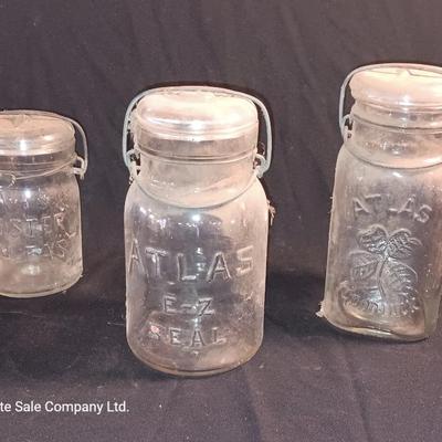 Three Antique jars with lids