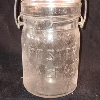Three Antique jars with lids