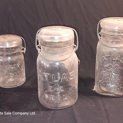 Three Antique jars with lids