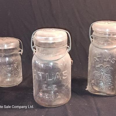 Three Antique jars with lids