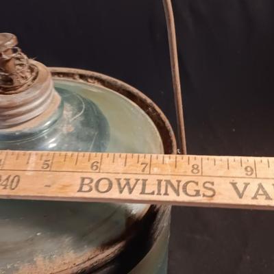 Antique glass kerosene jug by Cleveland Metal Products