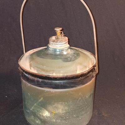 Antique glass kerosene jug by Cleveland Metal Products