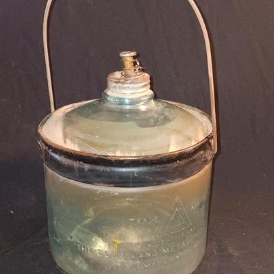 Antique glass kerosene jug by Cleveland Metal Products