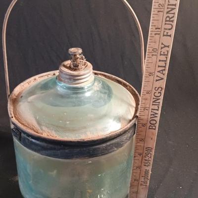 Antique glass kerosene jug by Cleveland Metal Products