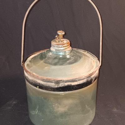 Antique glass kerosene jug by Cleveland Metal Products