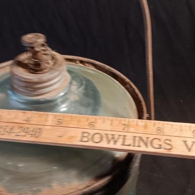 Antique glass kerosene jug by Cleveland Metal Products
