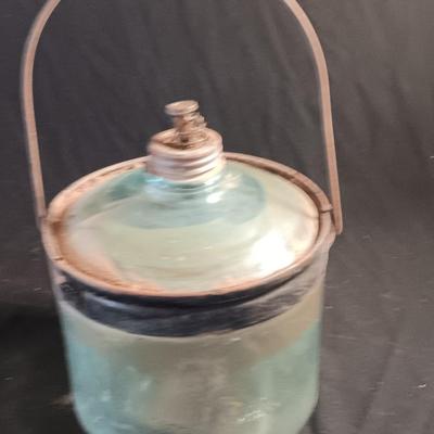 Antique glass kerosene jug by Cleveland Metal Products