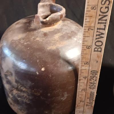 Primitive crock jug and old two-toned crock