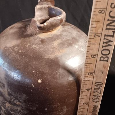 Primitive crock jug and old two-toned crock