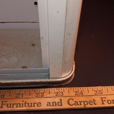 Vintage enamel / tin wall hanging spice shelf.