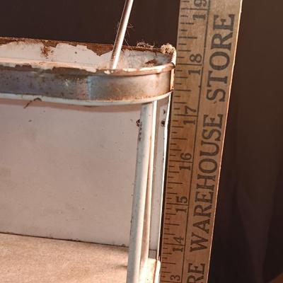 Vintage enamel / tin wall hanging spice shelf.