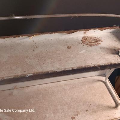 Vintage enamel / tin wall hanging spice shelf.