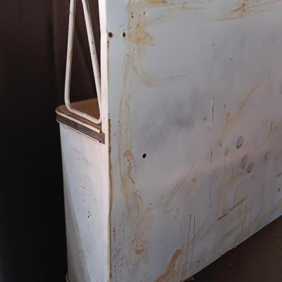 Vintage enamel / tin wall hanging spice shelf.