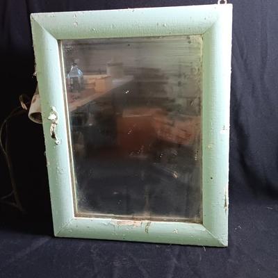 Antique Painted Medicine Cabinet with a light on the side