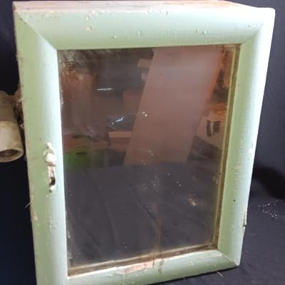 Antique Painted Medicine Cabinet with a light on the side