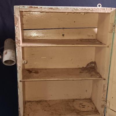 Antique Painted Medicine Cabinet with a light on the side