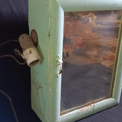 Antique Painted Medicine Cabinet with a light on the side