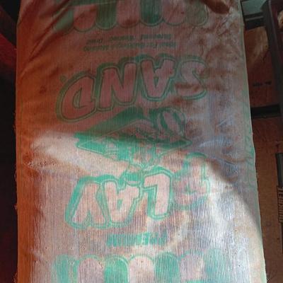 Seven bags of playground sand 50lbs each bag