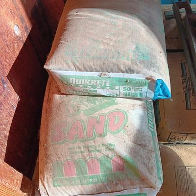 Seven bags of playground sand 50lbs each bag