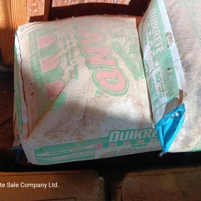 Seven bags of playground sand 50lbs each bag