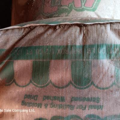 Seven bags of playground sand 50lbs each bag