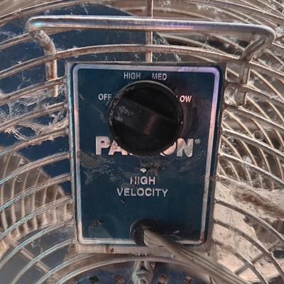 Two metal guard steel framed free standing electric fans