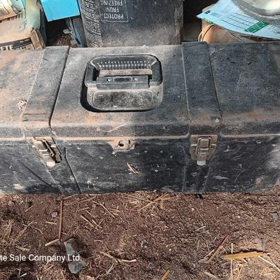 Black plastic toolbox with an assortment of tools