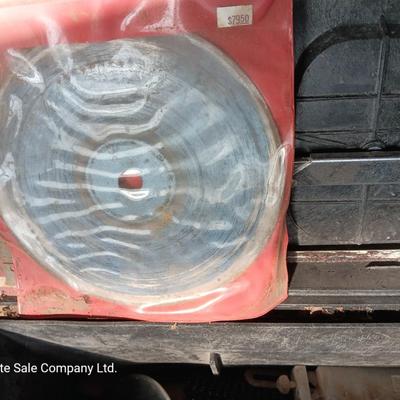 Black plastic toolbox with an assortment of tools