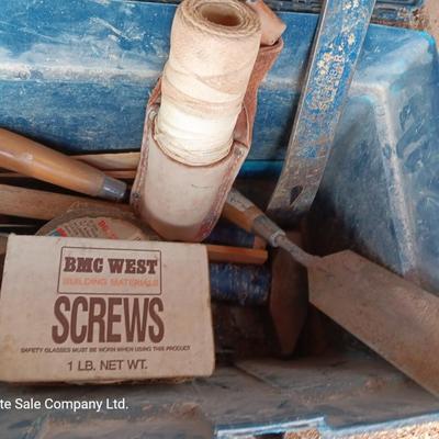 Blue plastic toolbox with an assortment of tools