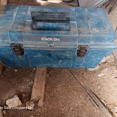 Blue plastic toolbox with an assortment of tools