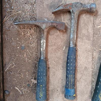 Four Ewing hand tools - hatchet - rock pick - sledgehammer - hammer