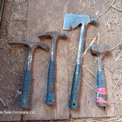 Four Ewing hand tools - hatchet - rock pick - sledgehammer - hammer