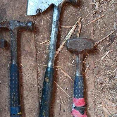 Four Ewing hand tools - hatchet - rock pick - sledgehammer - hammer