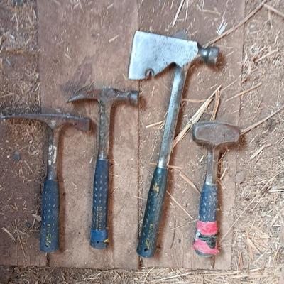 Four Ewing hand tools - hatchet - rock pick - sledgehammer - hammer