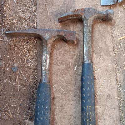 Four Ewing hand tools - hatchet - rock pick - sledgehammer - hammer