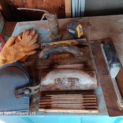 Assortment of tools - cement trowels - oil can - tape measure and more