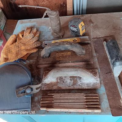 Assortment of tools - cement trowels - oil can - tape measure and more