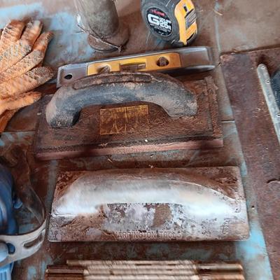 Assortment of tools - cement trowels - oil can - tape measure and more